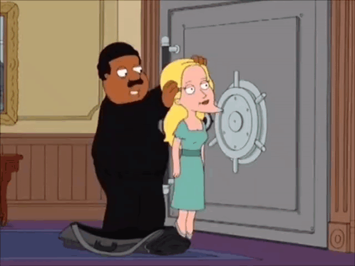Cartoon Man and Woman Standing in Front of Vault Door