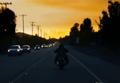 Cartoon Man In Front Of Large Crowd GIF