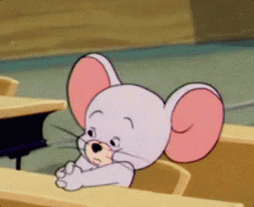 Cartoon Mouse Sitting at Desk