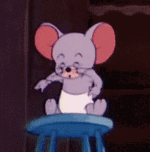 Cartoon Mouse Sitting On Blue Stool Smiling GIF