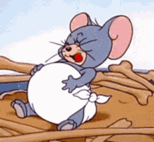 Cartoon Mouse Sitting on Bones