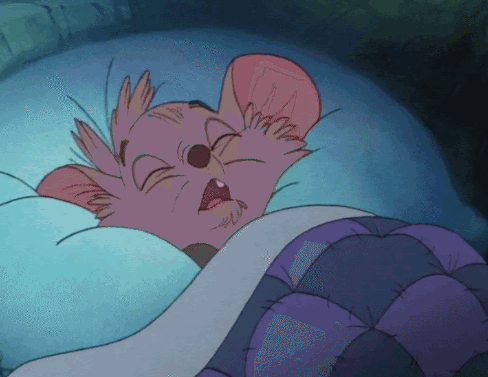 Cartoon Mouse Sleeping in Bed