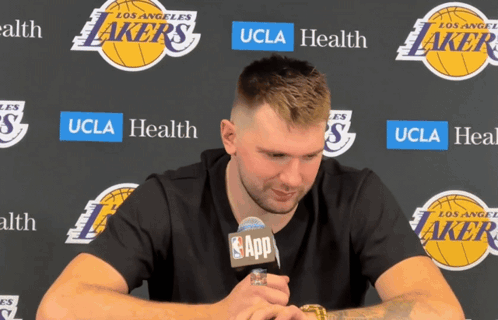 Cartoon Mummy Costume at Wooden Door with Skulls