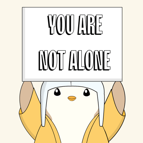 Cartoon Penguin Holding Sign Saying You Are Not Alone GIF