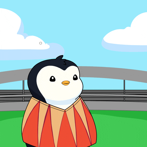 Cartoon Penguin in Red and Yellow Top