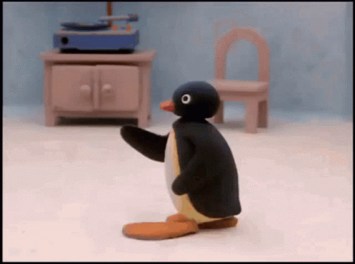 Cartoon Penguin Standing by Record Player