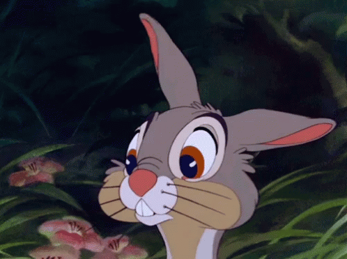 Cartoon Rabbit in Grass Looking at Camera