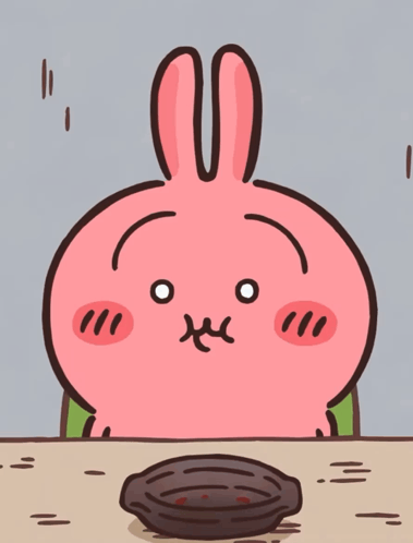 Cartoon Rabbit Sitting at Table With Empty Bowl