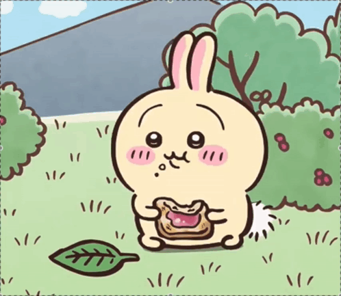 Cartoon Rabbit Sitting In Grass Eating GIF