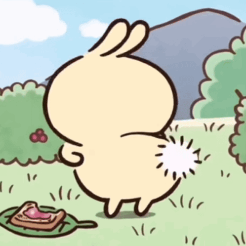 Cartoon Rabbit Standing In Grass GIF
