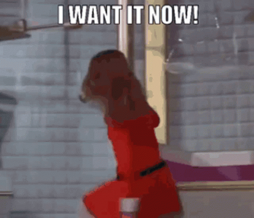 Cartoon Saying I Want It Now In Front Of Brick Wall GIF