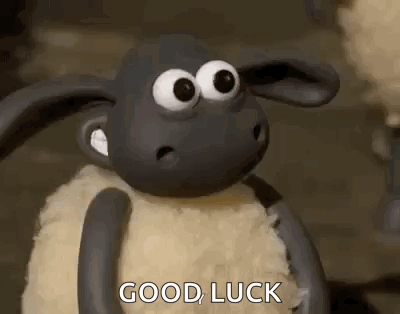 Cartoon Sheep With Big Eyes Giving Good Luck Sign GIF