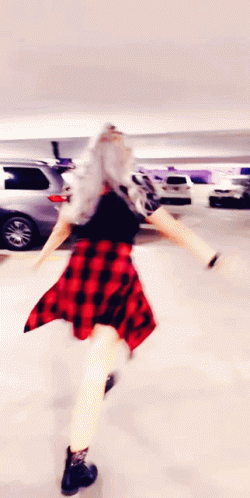 Woman Cartwheel In The Parking Lot GIF