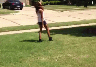 Woman Cartwheel Gymnastic Move GIF