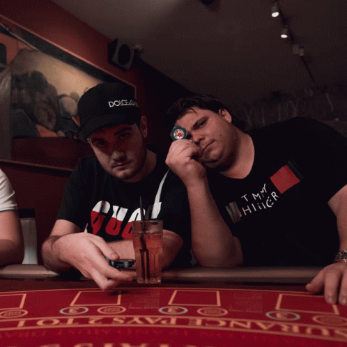 Casino Players Toss Their Poker Chips GIF