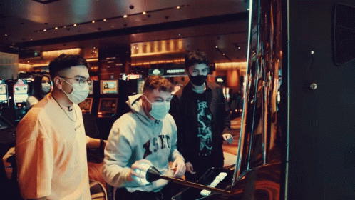 Casino Slot Machine Group Playing GIF