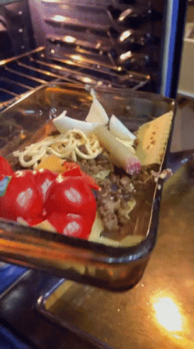 Casserole Dish With Tomatoes Cheese and Meat