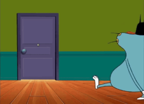 Cat And Cockroach Standing On Grassy Hill GIF