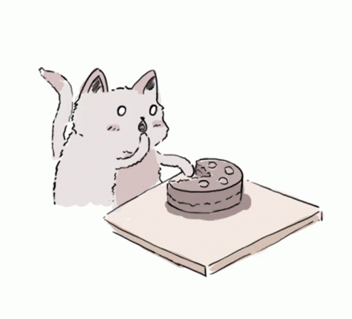 Animated Cat Eating Birthday Cake GIF