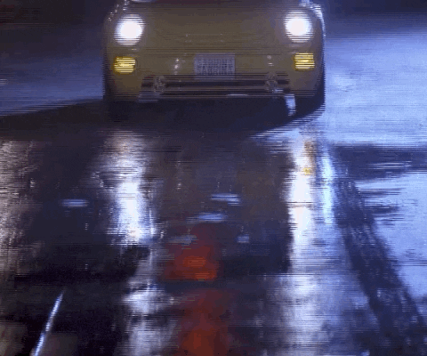 Cat Driving Over Someone GIF