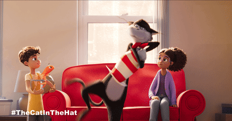 Cat in the Hat Holding Paper