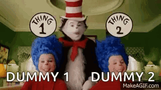 Cat in the Hat Standing Next to Two Dummy Boys
