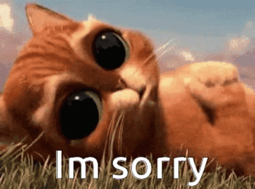 Cat Lying in Grass Saying Sorry
