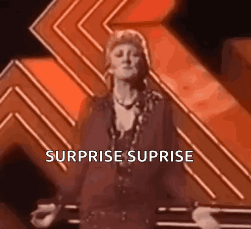 Cat Peeking From Blue Gift Box With Surprise GIF