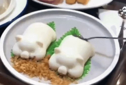Cat-Shaped Food on Plate with Spoon