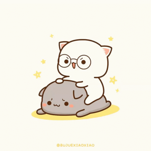 Cat Sitting on Another Cat
