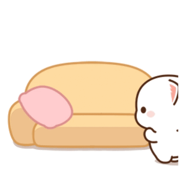 Cat Sitting on Couch with Pink Pillow