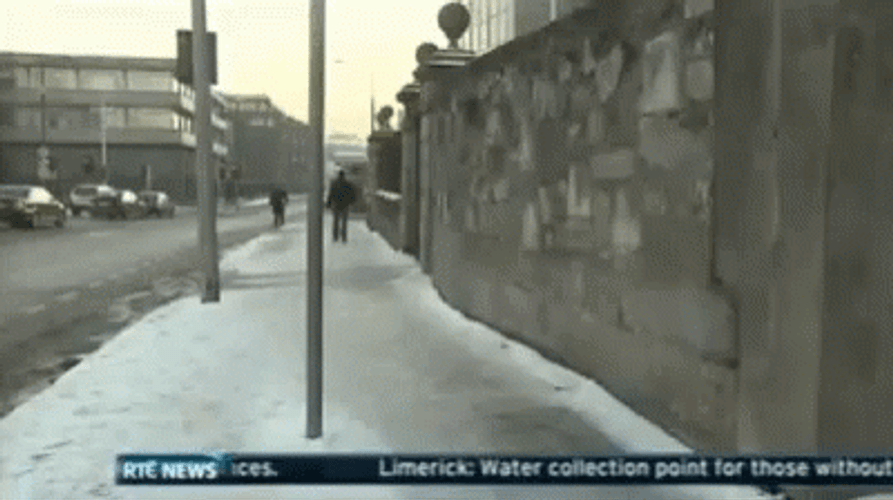 Caught On Camera The Man Slipping On Ice GIF