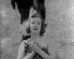 Lady Caveman Pulled By Hair GIF