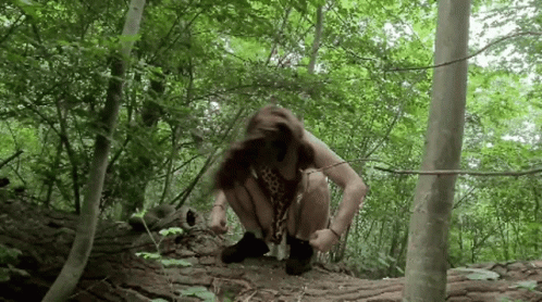 Long Haired Caveman Whipping Hair GIF