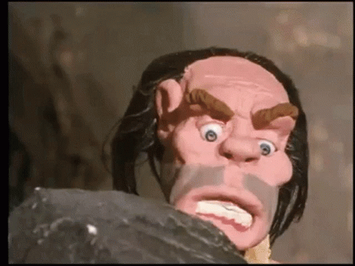 Caveman Startled By Spotted Tarantula GIF