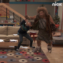 Caveman And Modern Guy Wrestling GIF