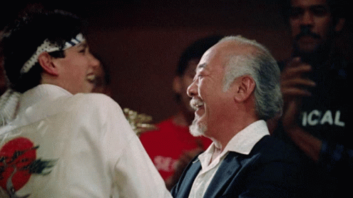 Celebrating Karate Kid Miyagi Raise Hand GIF
