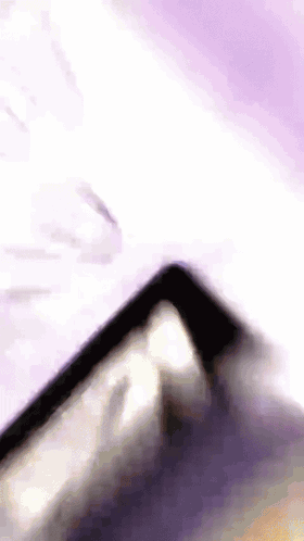 Cell Phone on Purple Background