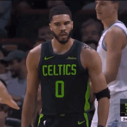 Celtics Basketball Player In Black And Green GIF