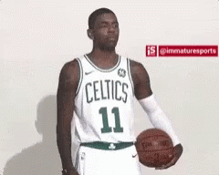Celtics Player Holding Basketball