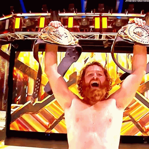 Champ Is Here Sami Zayn Showing Two Belts GIF