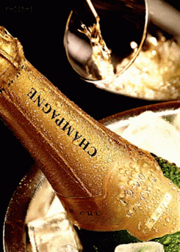 Champagne Bottle Being Poured