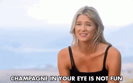 Champagne In Your Eye Not Fun GIF