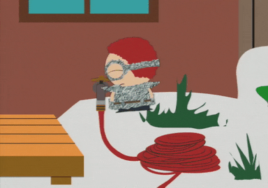 Character Of South Park Turning On Fire Hose GIF