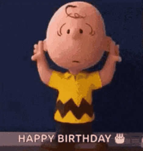 Charlie Brown From The Peanuts Movie Is Holding His Hands Up In The Air And Says Happy Birthday . GIF