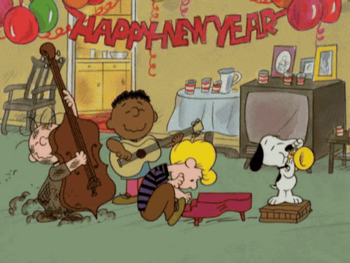 Charlie Brown Holding Paper And Smiling GIF