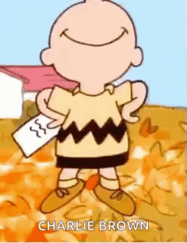 Charlie Brown Smiling Holding Paper GIF