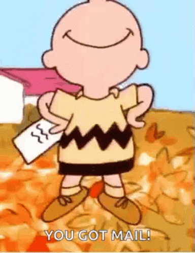 Charlie Brown Smiling With Paper GIF