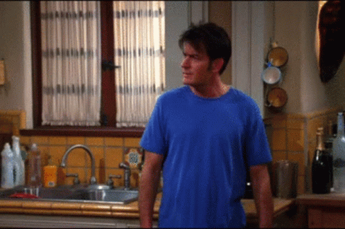 Charlie Harper Dancing In Kitchen GIF