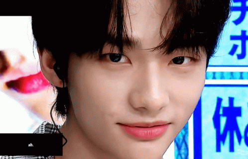 Charming Hyunjin Winking Face GIF